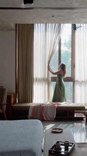 India Today HOME on Instagram: "Each surface of this 10,000 sq. ft. home carries a quiet sense of detail—from exposed brick and lime plaster walls to etched stairwell panels, wallpapered washrooms, and patterned tiles underfoot. Some surfaces draw the eye in with texture; others gently lead it outward, opening into large fenestrations and breezy verandahs. Together, they reflect the rhythms of everyday life—of light shifting through rooms, of movement and stillness, of morning routines and quiet