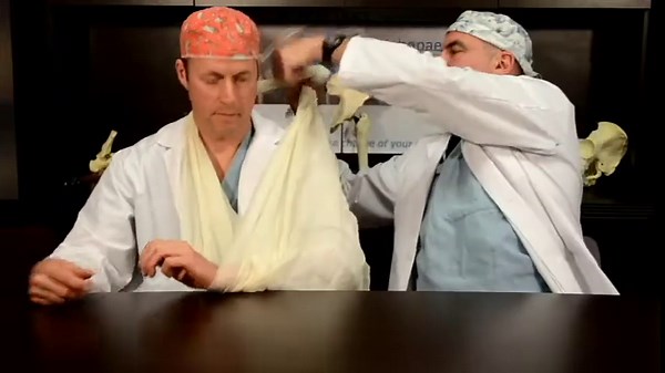 Proper arm sling application: step-by-step technique for supporting injured upper extremities