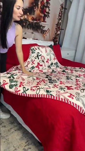 Bring festive comfort to your home with this soft Christmas throw blanket, featuring classic holiday