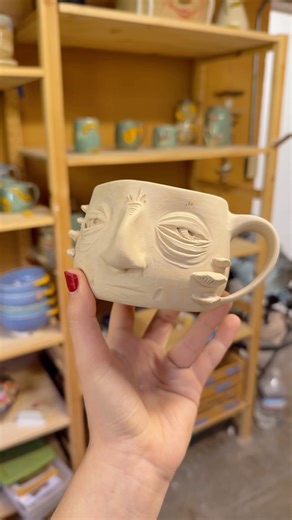 sculpting a face on a pottery mug! #ceramics #clayart #pottery