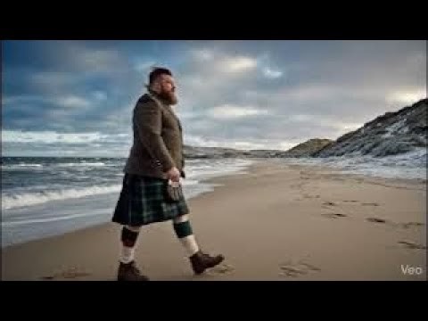 Scotsman Walking Wearing Kilt On Machrihanish Bay On Winter History Visit To Kintyre Scotland