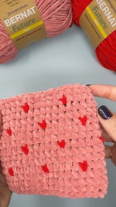 Did you know you can create these adorable color-work hearts by simply using a different color yarn for the first yarn over of the single crochet stitch. Great detail to add to any project Yarn: Bernat Future Tools: Susan Bates Silvalume 5mm hook Haven't had a chance to try our new Bernat Future yarns yet? You can visit select Walmart locations to go squish yourself. Shop at Walmart: https://bit.ly/4raEaKh | Bernat Yarn