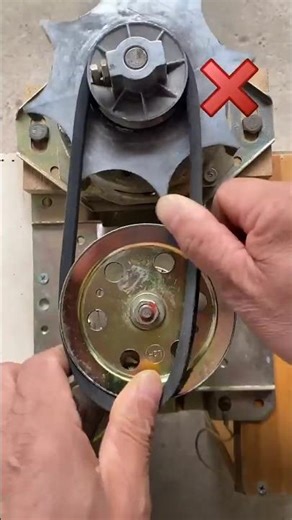 Installing a Drive Belt with a Rope.