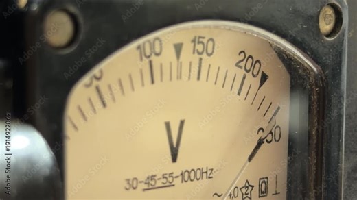 An authentic Soviet voltage stabilizer processes an electric current. The internal transformer vibrates steadily, producing a constant and heavy low-frequency humming sound.