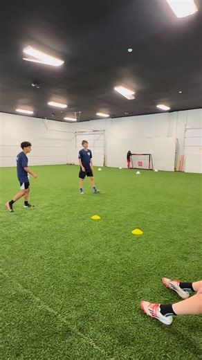 We use situational 1v1s like these to help players dominate their 1v1 attacking moments. Owen has to dribble though a gate and the dribble into the box before scoring. He's got both goals as an option allowing him more freedom, deception and creativity | Evolution Soccer Training
