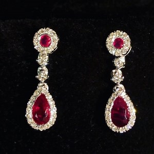 Elegant Ruby drop earrings set with diamond halos £1050 White gold call 07810893224 #ruby #rubies #diamond #loveit #diamondhalo #diamonds #rubyjewellery | Adrian Catheralls Diamond Merchant | Facebook