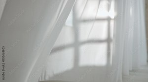 Transparent silk soft fabrics colored in blue purple neon light floating with shades shadows reflected on the textile, close up.