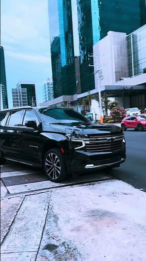 Black Suburban: Urban Luxury SUV in the City 🌆