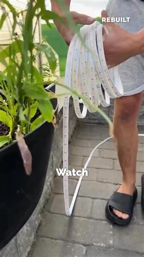 Rebuilt on Instagram: "Elevate your outdoor living space with professional-grade LED lighting installation. This hidden strip lighting technique transforms ordinary retaining walls into stunning architectural features that shine after sunset. The secret? Waterproof LED strips, strategic placement, and clean cable management through concealed channels. The warm glow highlights your hardscape’s natural texture while creating an inviting ambiance for evening entertaining. Whether you’re a DIY enthu