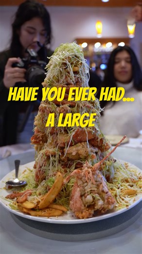 Have you ever eaten a lobster tower? Watch our family tackle it