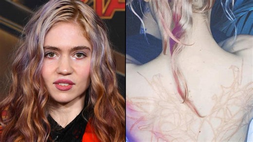 Grimes unveils huge new "alien scars" back tattoo