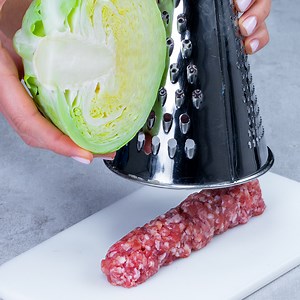 You haven’t eaten authentic romanian mici if you haven’t prepared them with cabbage Ingredients: minced meat - 600 g (21.16 oz) cabbage - 300 g (10.6 oz) eggs - 2 pieces onion - 100 g (3.5 oz) garlic - 3 cloves tomato sauce - 50 ml (⅕ cup) bread crumbs - 50 g (1.76 oz) salt - 10 g (0.35 oz) black pepper - 5 g (0.18 oz) basil - 5 g (0.18 oz) IN THE OVEN 180 °C (356 °F) / 30 minutes | Cookrate