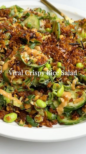 Jessica Sepel - JSHealth® 🧿🧿🧿 on Instagram: "VIRAL CRISPY RICE SALAD ✨⁠ ⁠ Have you seen this viral salad all over your feed? We were inspired by @kalejunkie and her drool-worthy creations. This is our version of her recipe made in the HQ, with a few little tweaks! 🤍⁠ ⁠ The verdict? We are going to be making this one on repeat... SO DELICIOUS. We went for a peanut-style dressing and celery instead of avocado because our avocado refused to ripen 😂. ⁠ ⁠ Have you tried it? ⁠ ⁠ Ingredients: ⁠ - 