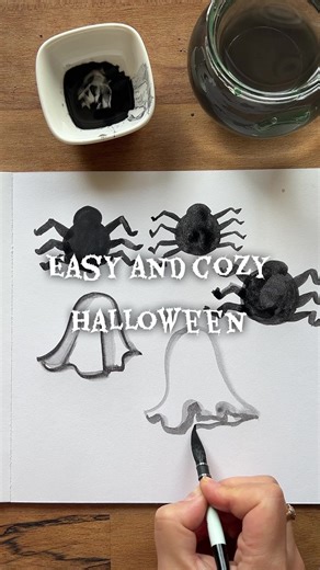 This year, I’m planning to decorate the room (and Rumi’s corner 😄) with my own Halloween watercolor art! Spiders, ghosts, and cozy vibes only 👻 Because every home — even a snake’s — deserves a bit of spooky charm 🎨 🕸 Prints & originals in bio 💌 #momartist #watercolorart #halloweenvibes #cozydecor #artistmom