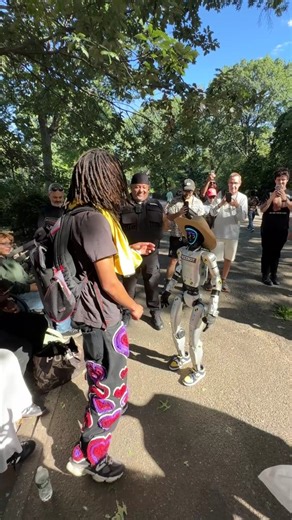 Rizzbot on Instagram: "Robot messing with humans in the park #robot"