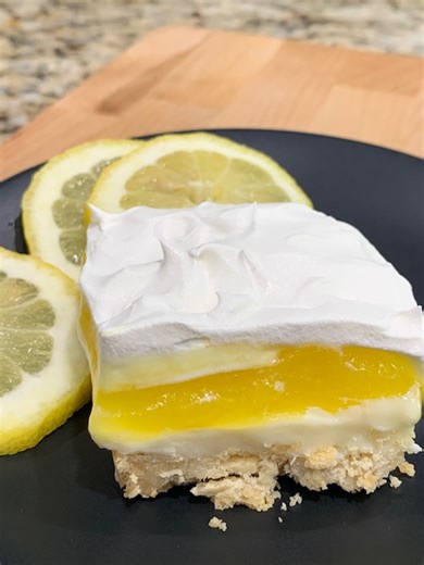Heavenly Lemony! A delightful and easy lemon dessert you'll want to repeat. We highly recommend this recipe and think you'll really enjoy it. It's light, flavorful, and extremely easy to prepare. It's a perfect dessert to serve to guests or just enjoy yourself. #dessert #pies #lemon #easyrecipes | Scott & Karen