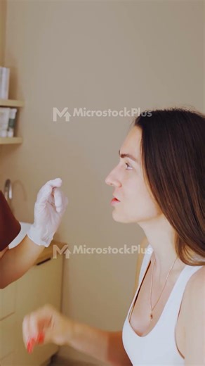 Beauty expert explains, Skin specialist guides woman, Professional demonstrates facial treatment