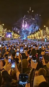 10K views · 169 reactions | New Year's Eve in Paris, France, is being the target of a lot of criticism on the networks after a video went viral where no one is “living in the moment”. The number of people recording is immensely greater than the number of hugs and people believe this to be worrying. | Inspire Your Trip | Facebook