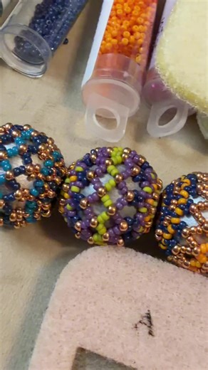 Obsessed with making netted beaded beads right now! #offthebeadedpath #beadedpath #masteringbeadwork #beadedbead