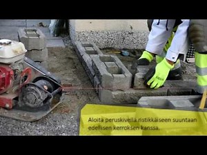 Lakka lohkomuurikivien asennus