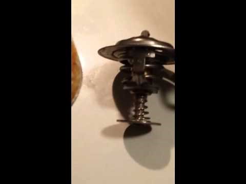 Replacing an testing thermostat on Kia Sorento 2003 part 3