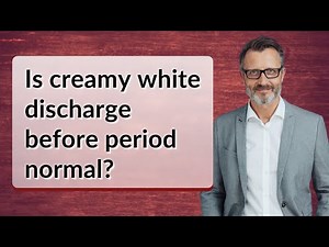 Is creamy white discharge before period normal?