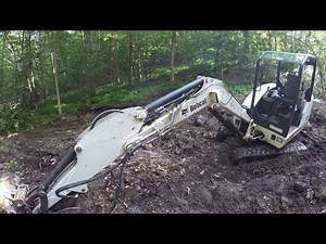 Bobcat mini excavator arm cylinder repair | Finish digging the woods pond