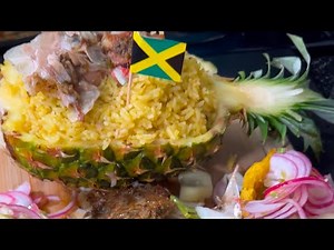Whole oven Roasted Red Snapper with pineapple rice, pickled onions and fried plantain cups