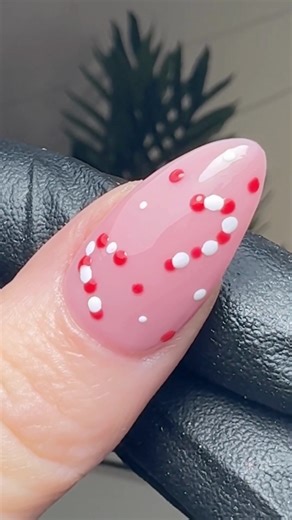 🍬✨ Dotted candy cane magic! ✨🍬 Brand Ambassador Natalie Essery shows how to create this adorable dotted candy cane design — crisp red and white details with a fun, playful twist 💅❤️🤍 Perfect for clients who love classic Christmas nails with a cute, modern finish. Watch the full tutorial and add this festive favourite to your holiday sets! ✨🎄 @NaturalBeautyLeeds #CandyCaneNails #DottedNailArt #ChristmasNailArt #FestiveNails #Nailchemy #ProNailTech #NailArtTutorial #NailTechLife #WinterNails 