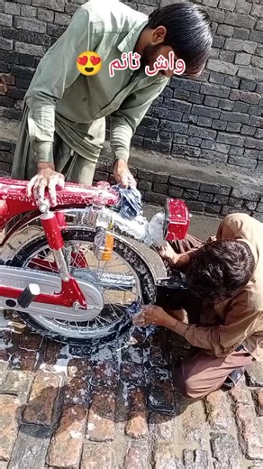 Washing a Stunning Red Motorcycle with Unique Design
