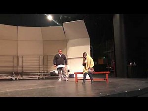 Fat guy in small sweater sings opera!