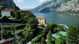 Amazing Villa on Lake Como, Italy. A luxury residence located on the shore of Lake Como overlooks the amazing landscape. The real estate has an outside pool and a private big garden