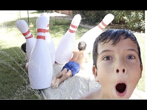 Slip & SLIDE bowling! HUMAN BOWLING BALL!