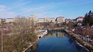 Bern, Switzerland: Aerial drone footage of the Bern cityscape with the Bundeshaus, the national parliament along the Aar river in Switzerland capital city.