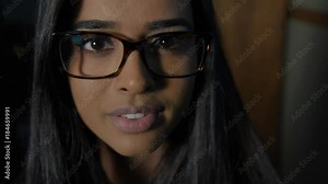 Indian Woman Wearing Hipster Glasses Looking Into Camera Lens
