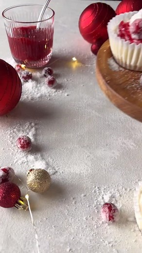 mini cranberry mousse cakes ✨ basically a mix between a light and fluffy mousse and creamy cheesecake! these mini cakes have a crispy graham cracker crust, airy cream cheese mousse filling, and simple cranberry sauce swirled on top. they’re also no bake and super easy to whip up! recipe is on my website ❤️ #Christmas #Christmascake #Christmasdessert #moussecake #nobake | Eats Delightful