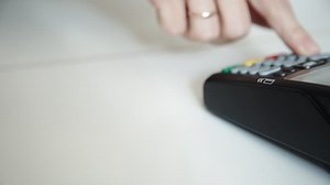 Moment of payment with a credit card through terminal