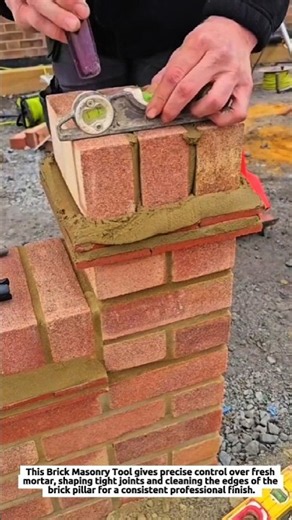 Brick Masonry Tool Shapes Mortar Joints for Precise Pillar Finishing