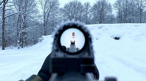 Download Shooting Rifle Through Scope in Snowy Woods During Winter for free