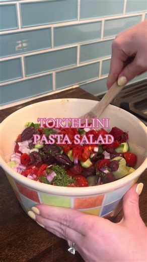 This tortellini pasta salad is perfect for summer and only takes 15 minutes to make. Filled with spinach & cheese tortellini, fresh veggies and a homemade dill dressing. This easy pasta salad recipe is the perfect summer side dish. Ingredients: Tortellini Cucumbers Cherry tomatoes Red onion Roasted red peppers Kalamata olives Dressing: olive oul, red wine vinegar, lemon juice, fresh dill #pastasalad #summerrecipes #summersalad #tortellini #easyrecipeideas