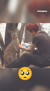 921K views · 10K reactions | This little #kangaroo had suffered the consequences of a devastating wild*fire, but a big-hearted woman came to help him. 梁 ❤️ | The Kiwi | Facebook