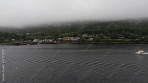 Canada inside passage island homes boat. Passage A coastal route for ships and boats. Pacific Northwest coast of the North American Fjord of Alaska and Canada.