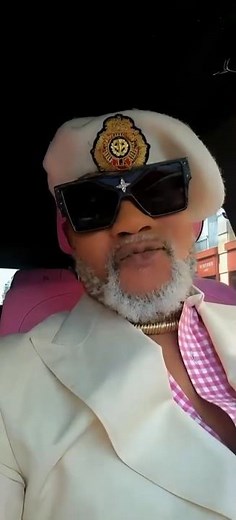 Living life in pink with Koffi Olomidé, the famous legend, behind the wheel of his magnificent Ro...