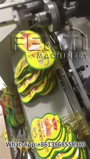 Automatic Hang tag Stringing Machine.