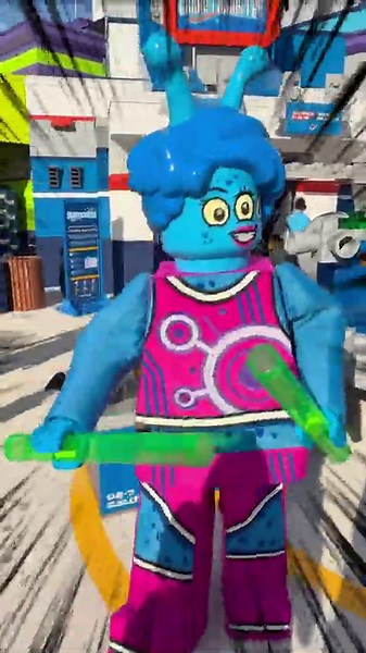 Alien dancer busts a move at LEGOLAND Florida's Galacticoaster!