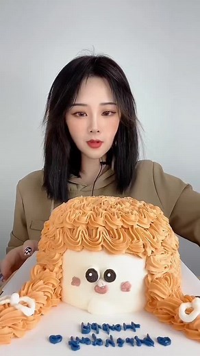 Delicious Birthday Cake with Fun Orange Icing Design