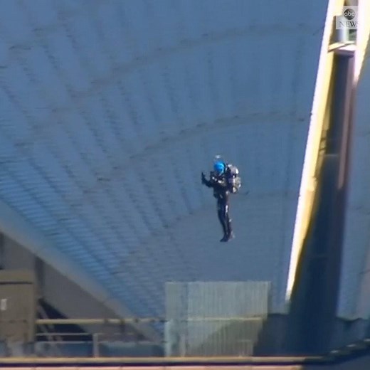 FLYING HIGH: An Australian entrepreneur flew around the Sydney Opera House via jetpack, spinning and moving backwards and spectators watched in awe. He previously flew an earlier version of the jetpack around the Statue of Liberty in 2015. https://abcn.ws/32BqKMK | ABC News