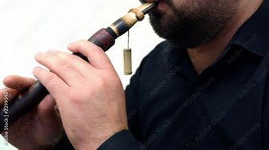 Man playing classical music in Balaban. Azerbaijani Ethnic Musical Instrument Balaban. 4K