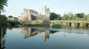 Colossal Cahir castle grand Ireland reflections at river Suir