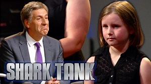 Lily missed having her father around, so she had her mom sew her a doll with his face on it. That was the birth of 'Wish U Were Here Doll' - cushioned dolls for children created with images of family members. The dolls are aimed at kids with mothers or fathers who work remotely, or for family members who have passed away. Lauren Martin is seeking a $25,000 investment for 20% of her doll manufacturing business. | Shark Tank Global